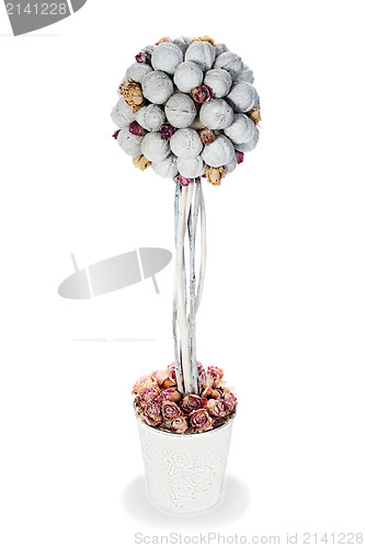 Image of abstract composition from nuts and dry roses arrangement centerp