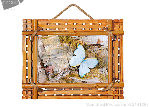 Image of bamboo photo frame with abstract composition of butterflies, bir