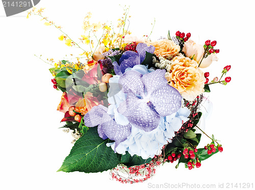 Image of colorful floral arrangement of roses, lilies, freesia, orchids a
