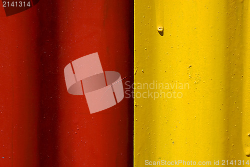 Image of abstract colored red and yellow iron metal