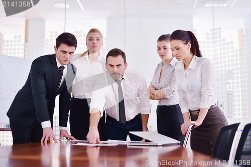 Image of business people in a meeting at office