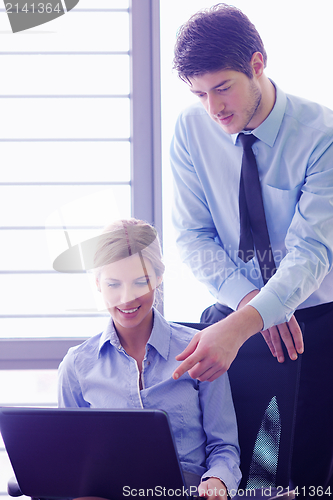 Image of business people in a meeting at office