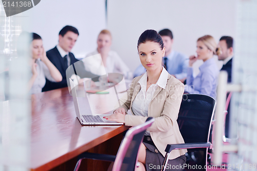 Image of business people in a meeting at office