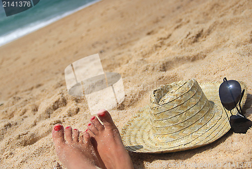 Image of Seacoast and straw hat 