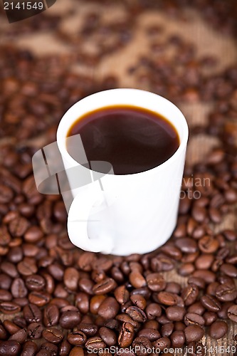 Image of cup of coffee and beans 