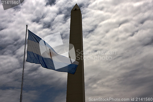 Image of waving flag and tower 