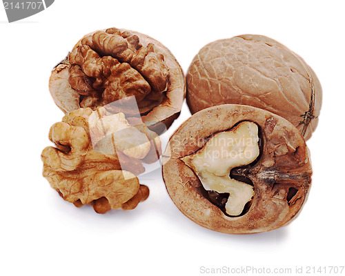 Image of walnut and a cracked walnut isolated on the white background