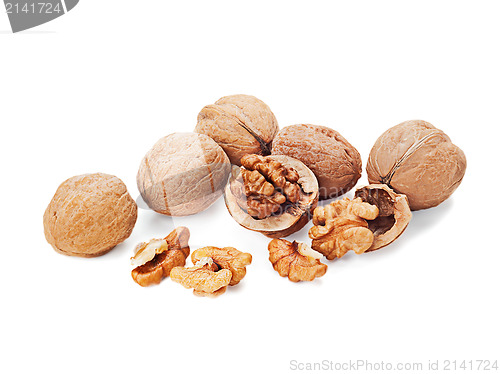 Image of walnuts and a cracked walnut isolated on the white background 