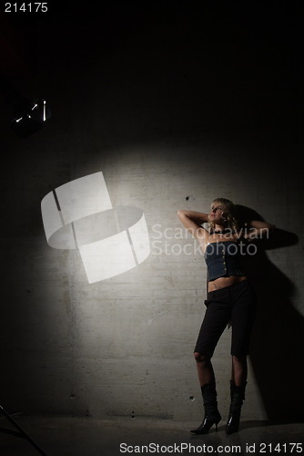 Image of young woman in light