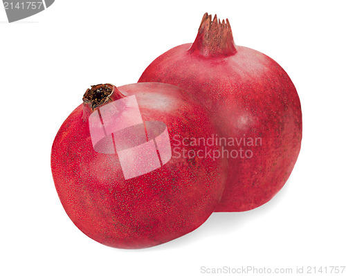 Image of pomegranate fruits closeup isolated on white background