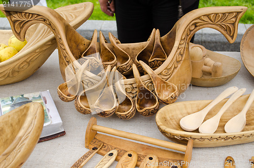 Image of wooden ornate spoons set bowl of composition fairs 