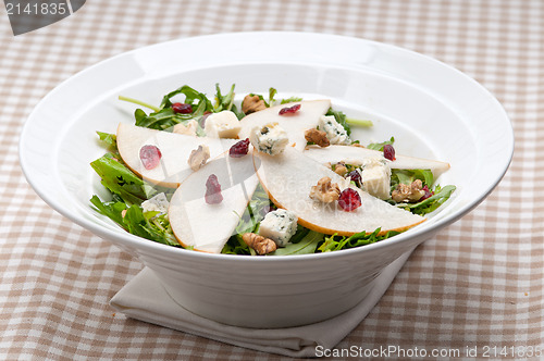 Image of Fresh pears arugula gorgonzola cheese salad