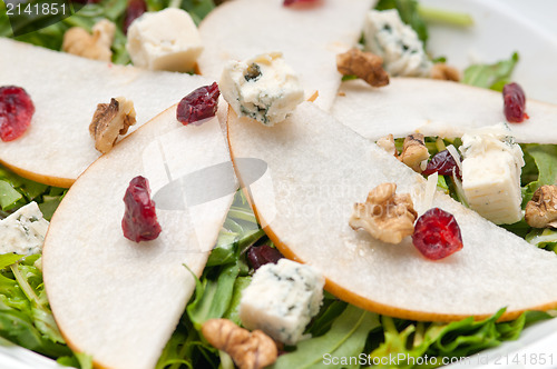 Image of Fresh pears arugula gorgonzola cheese salad