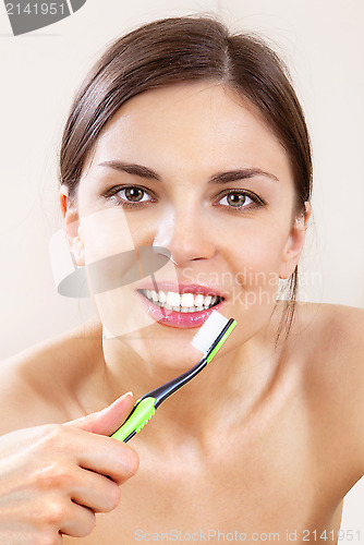 Image of beautiful woman with tooth-brush l