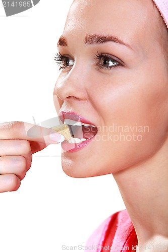 Image of girl eats sweets