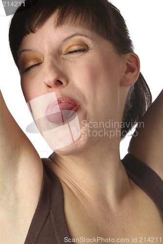 Image of young woman shows her tongue