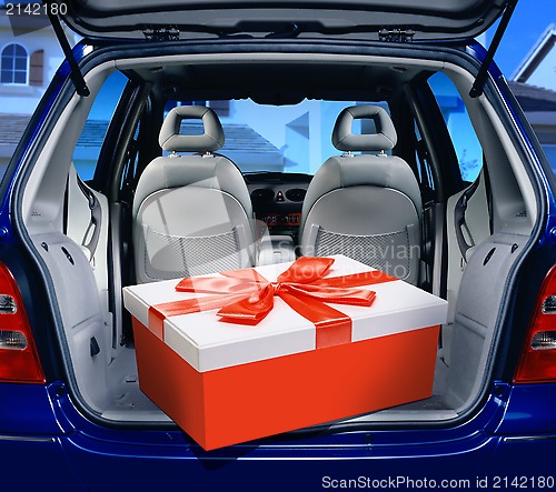 Image of red present in a car