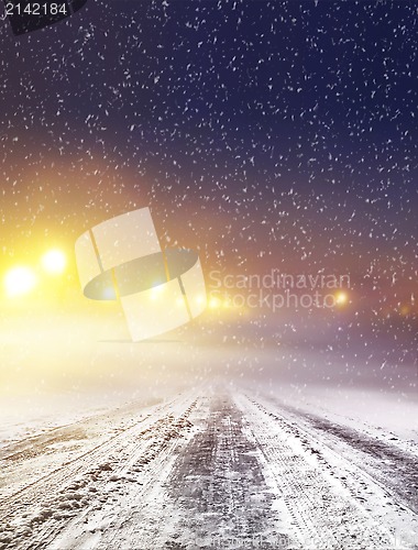 Image of winter road at night