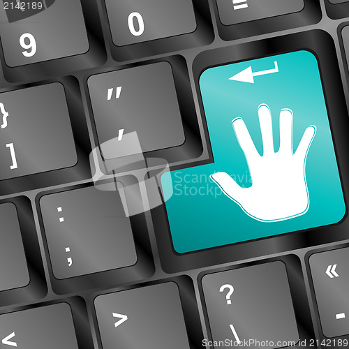 Image of A keyboard with a blue key with the hand icon