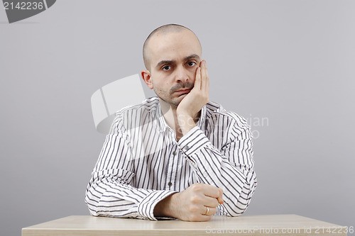 Image of Man at desk