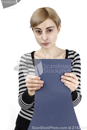 Image of Woman holding a paper