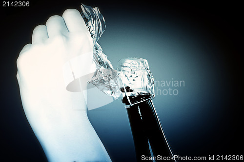 Image of Opening champagne bottle