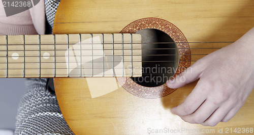 Image of Playing the guitar