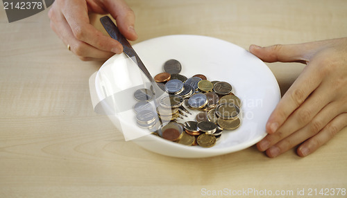 Image of Eating some coins