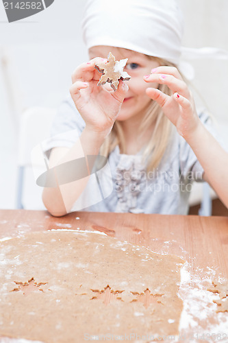 Image of Star shaped piece of gingerbread dough