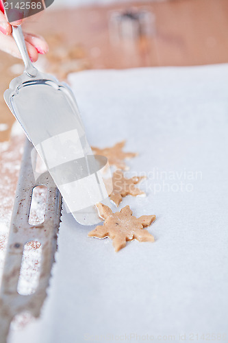 Image of Shaped gingerbread dough and server