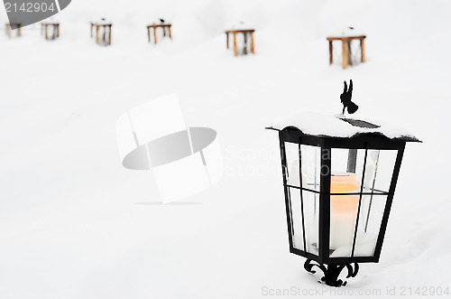 Image of vintage Christmas lantern with in the cemetery