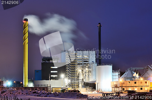 Image of power station at night in winter