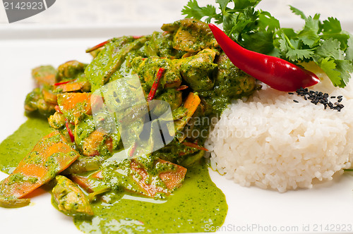 Image of chicken with green curry vegetables and rice
