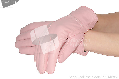 Image of Closeup leather pink gloves on graceful hands