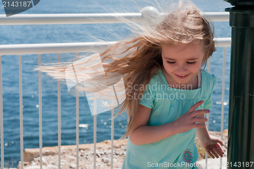 Image of Little girl with long hair