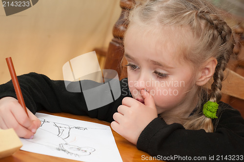 Image of Little girl is drawing