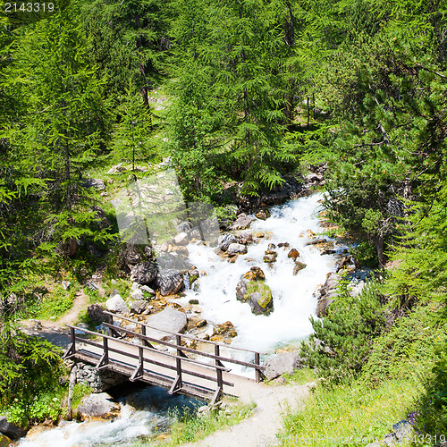 Image of Bridge on mountain river