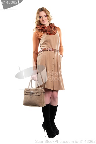 Image of woman in dress with a handbag