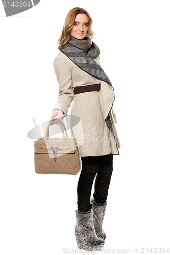 Image of Young woman in a coat
