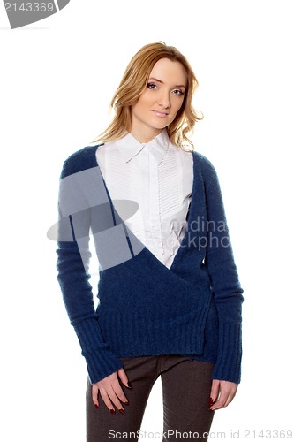 Image of young woman in pants and pullover