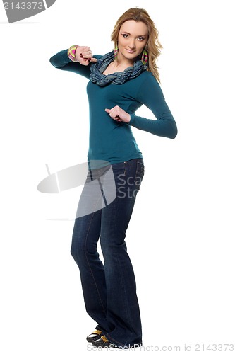 Image of Young woman in a blue jeans