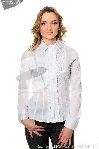 Image of young woman in pants and shirt