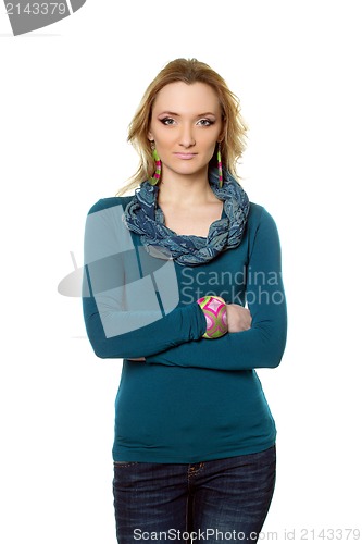 Image of young woman in jeans and blouse