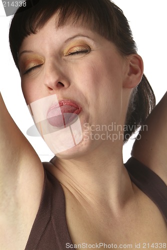 Image of young woman shows her tongue