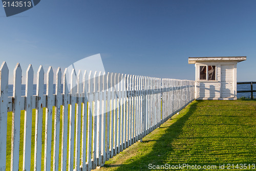 Image of White beach hut