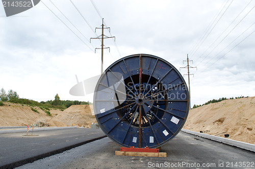 Image of high voltage cable reel roll road construction 