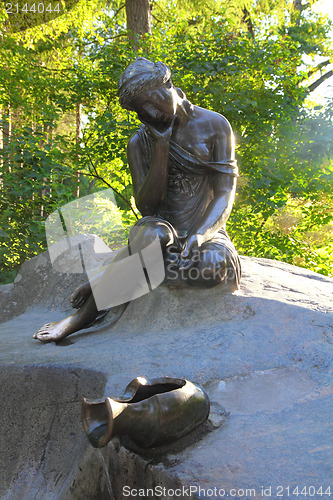 Image of girl with jug statue