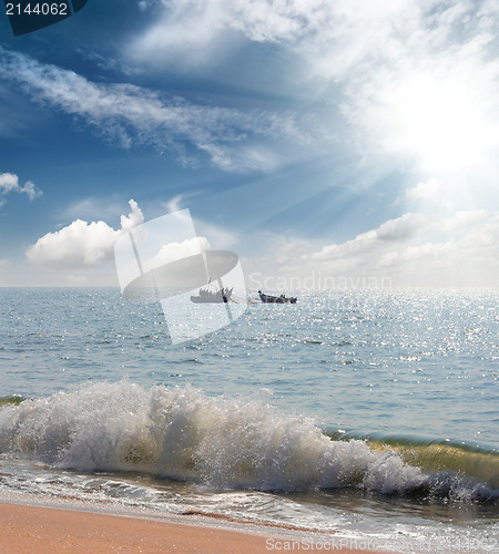 Image of landscape with fisherman boats in sea