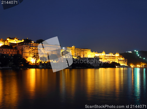Image of night view on palace and lake in Udaipur