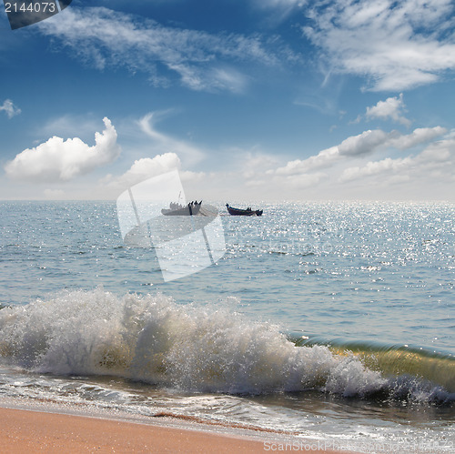 Image of landscape with fisherman boats in sea